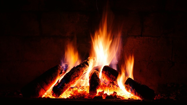 burning wood in a fireplace
